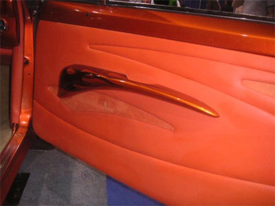 Fiberglass arm rest painted with orange flames